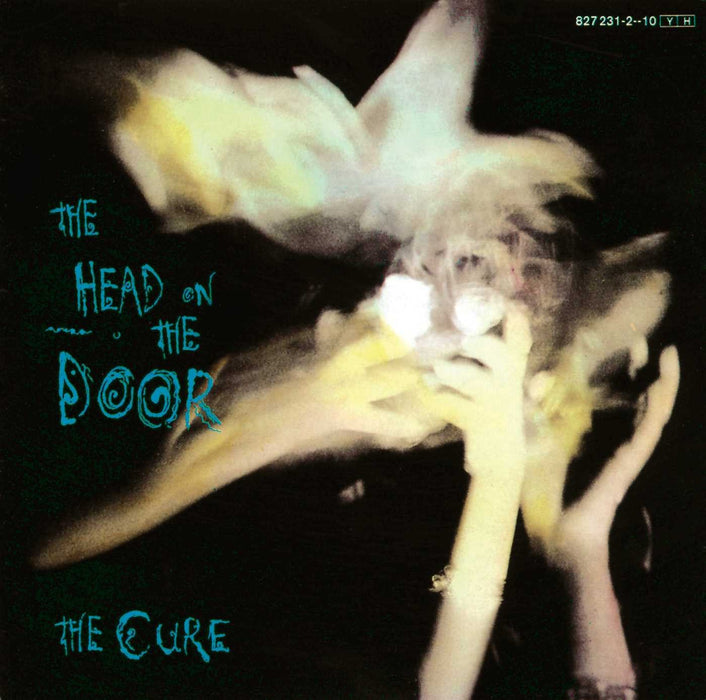Cure (The) - The Head On The Door;